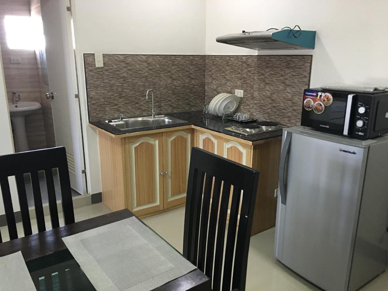 Beinte Singko De Marso Apartments Candon Экстерьер фото